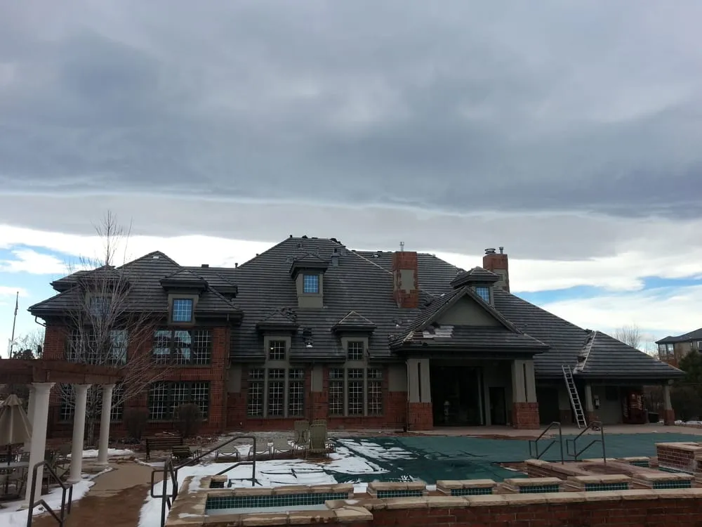 Slide of AAM Roofing