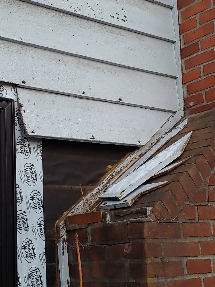 Slide of Aardvark Roofing