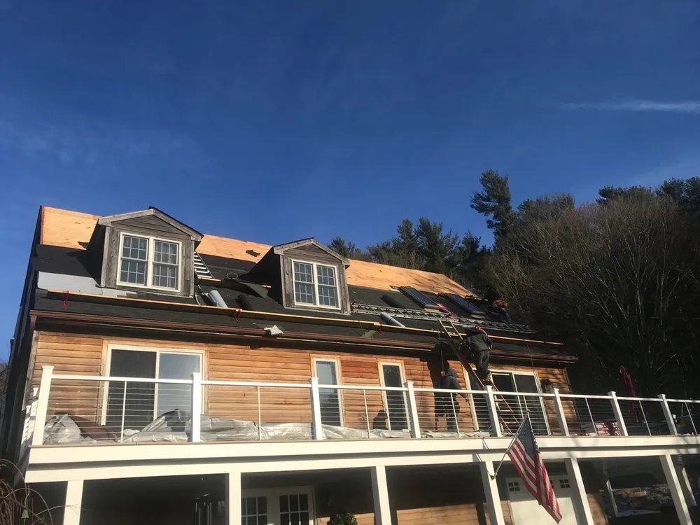 Slide of Aardvark Roofing