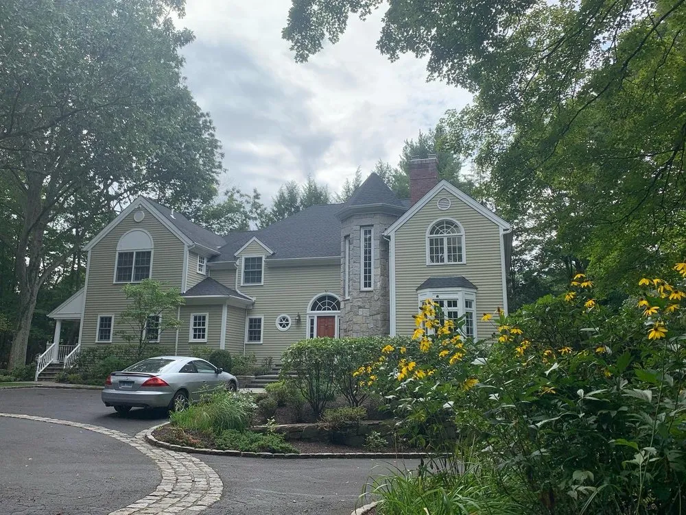 Slide of Aardvark Roofing