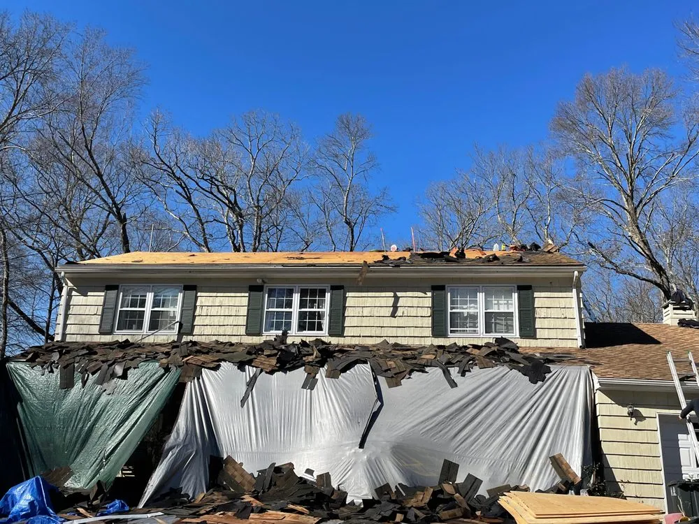 Slide of Aardvark Roofing