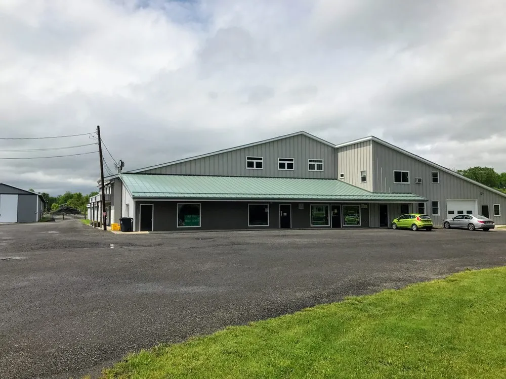 Professional storm damage roof repair in Whitney Point, NY by AB Construction & Roofing