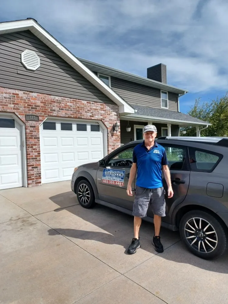 Slide of Abbotts Roofing Siding Gutters