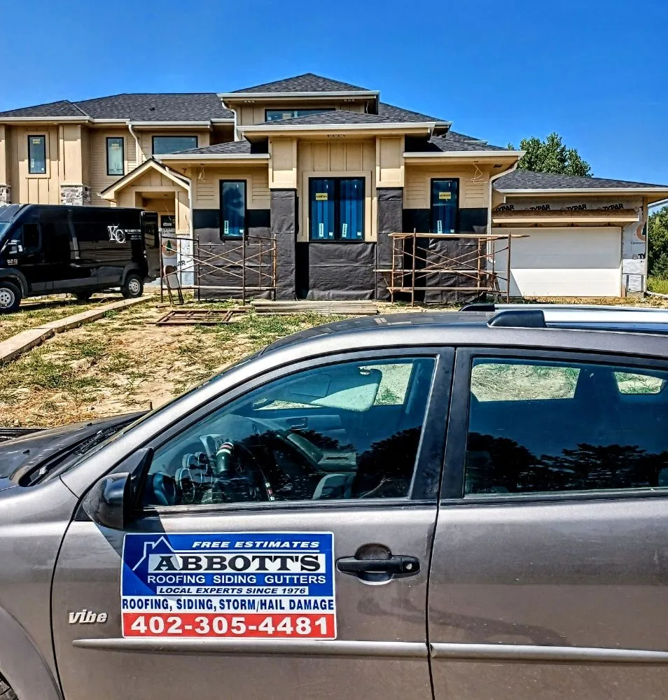 Slide of Abbotts Roofing Siding Gutters