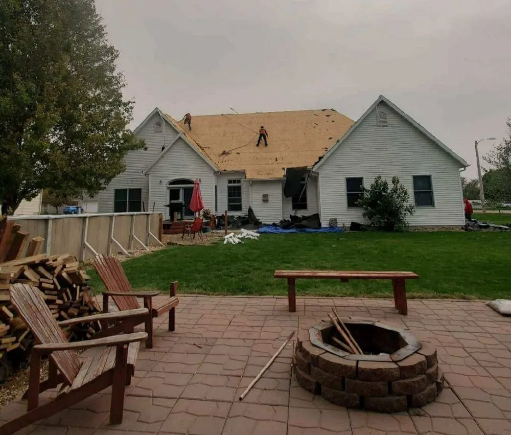 Slide of Abbotts Roofing Siding Gutters