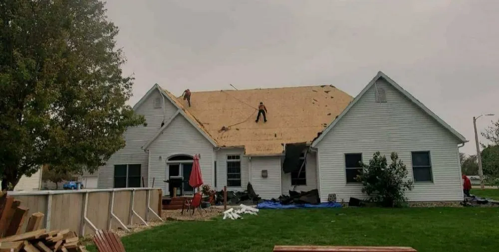 Slide of Abbotts Roofing Siding Gutters