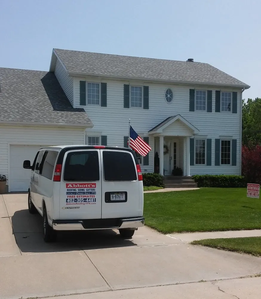 Slide of Abbotts Roofing Siding Gutters