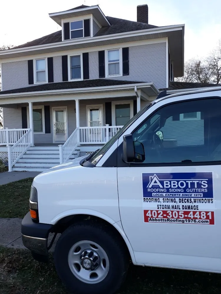 Slide of Abbotts Roofing Siding Gutters