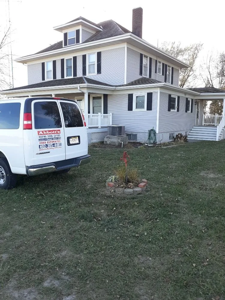 Slide of Abbotts Roofing Siding Gutters