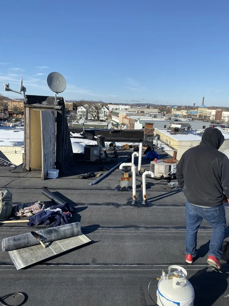 Slide of ABC Roofing & Construction