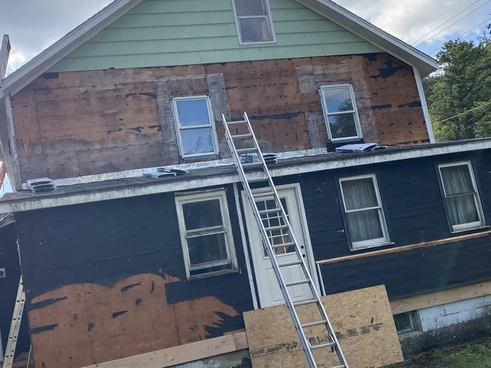 Slide of ABC Roofing & Siding