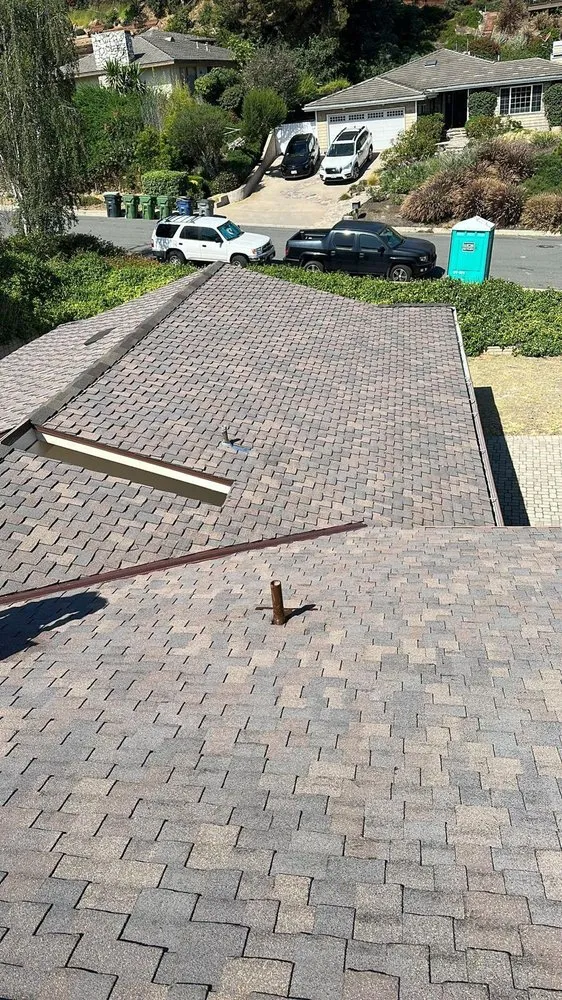 Slide of ABD Roofing Services