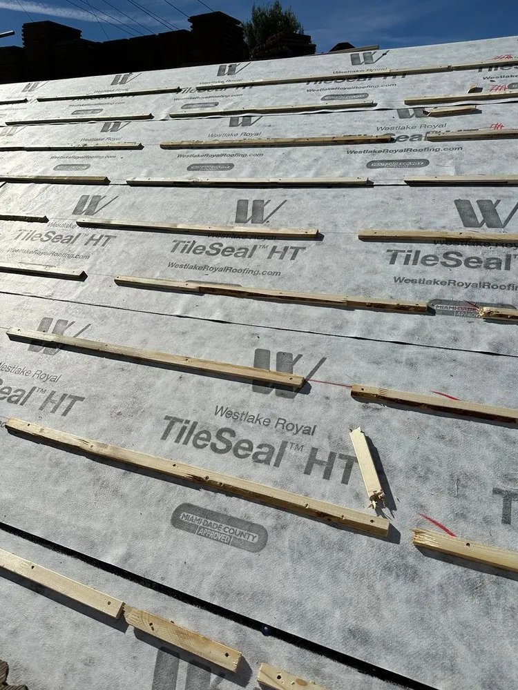 Slide of ABD Roofing Services