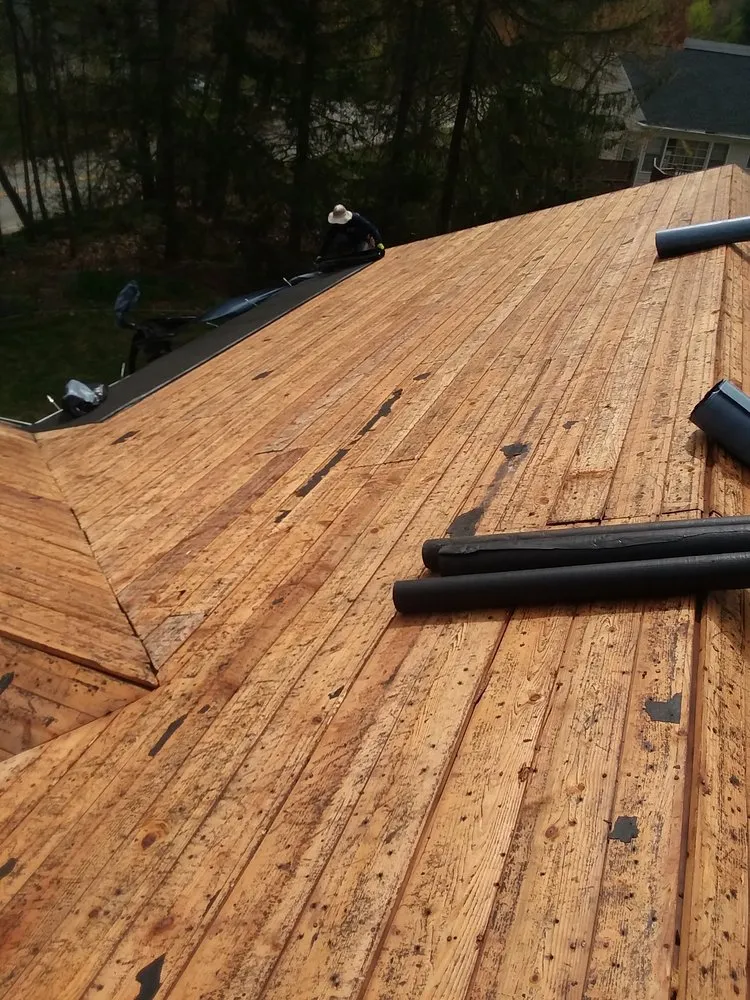 Slide of Abey Roofing Construction