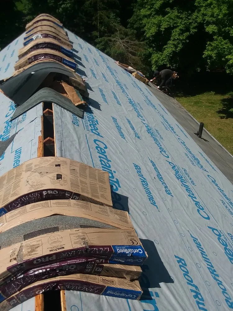 Slide of Abey Roofing Construction