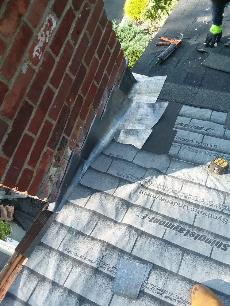 Slide of Abey Roofing Construction