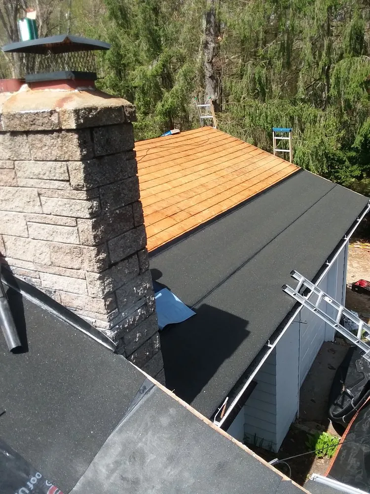 Slide of Abey Roofing Construction