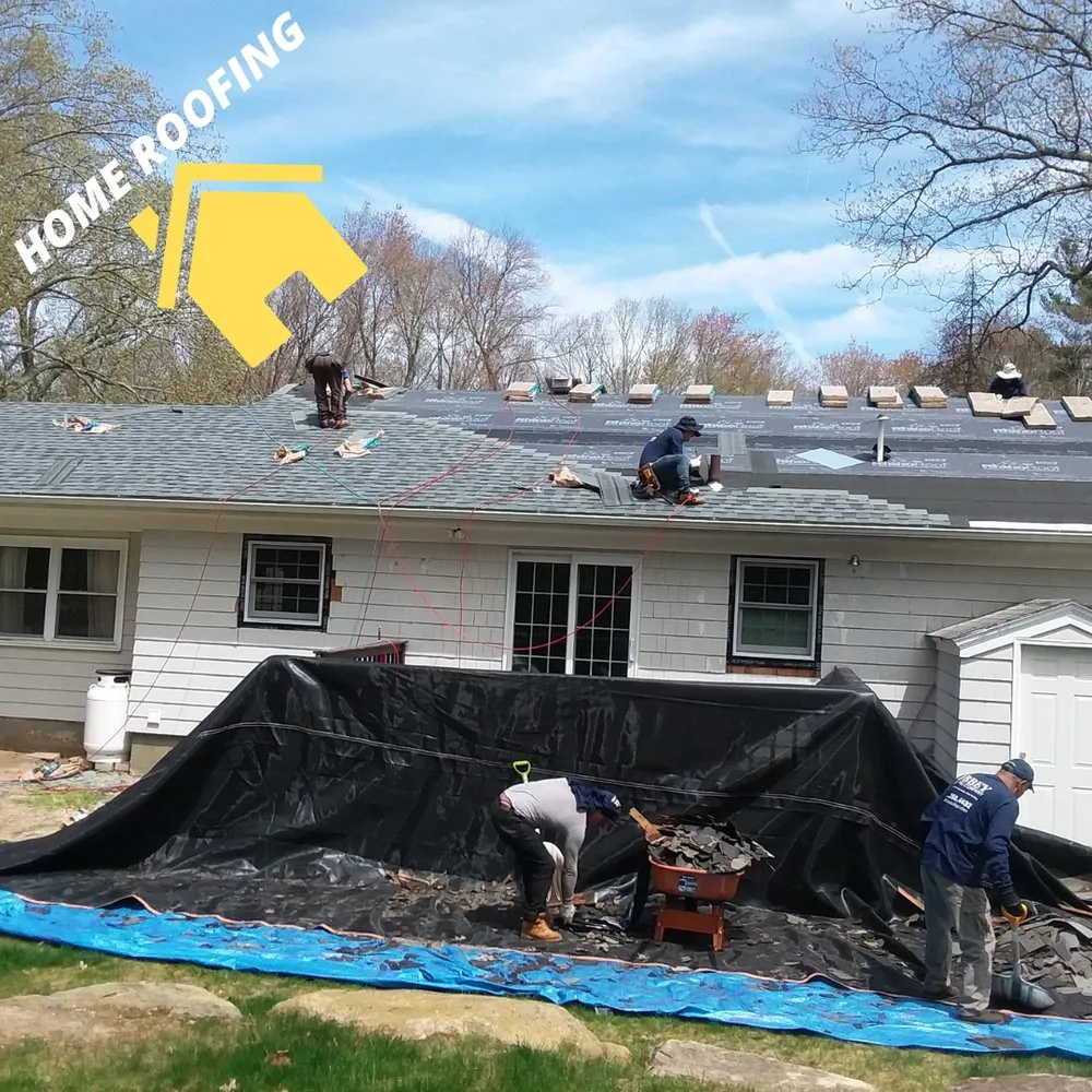 Slide of Abey Roofing Construction