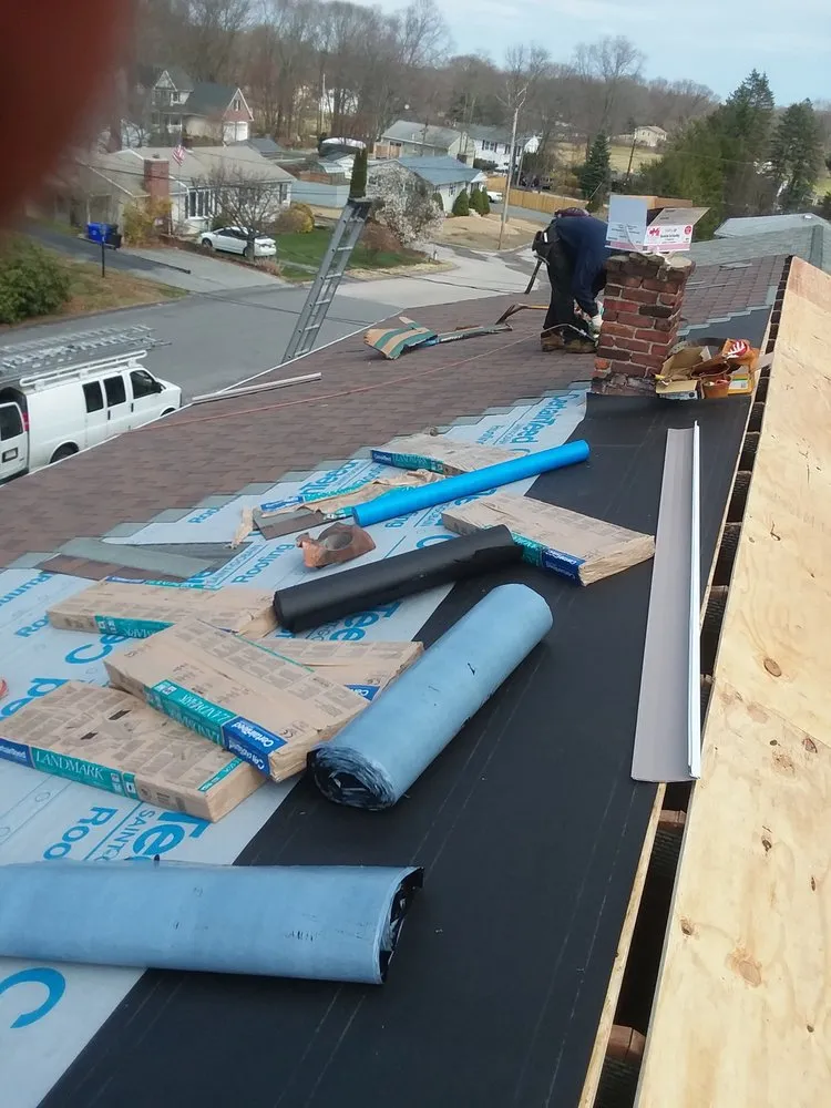 Slide of Abey Roofing Construction