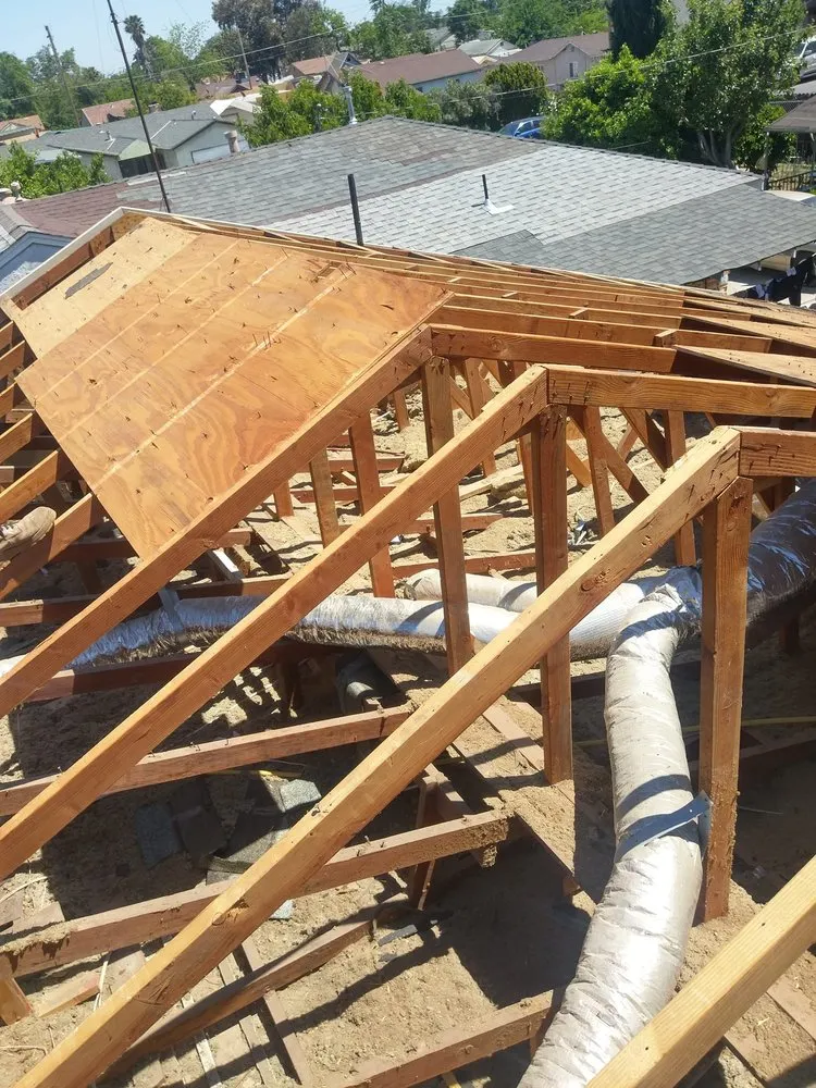 Slide of Abey Roofing Construction