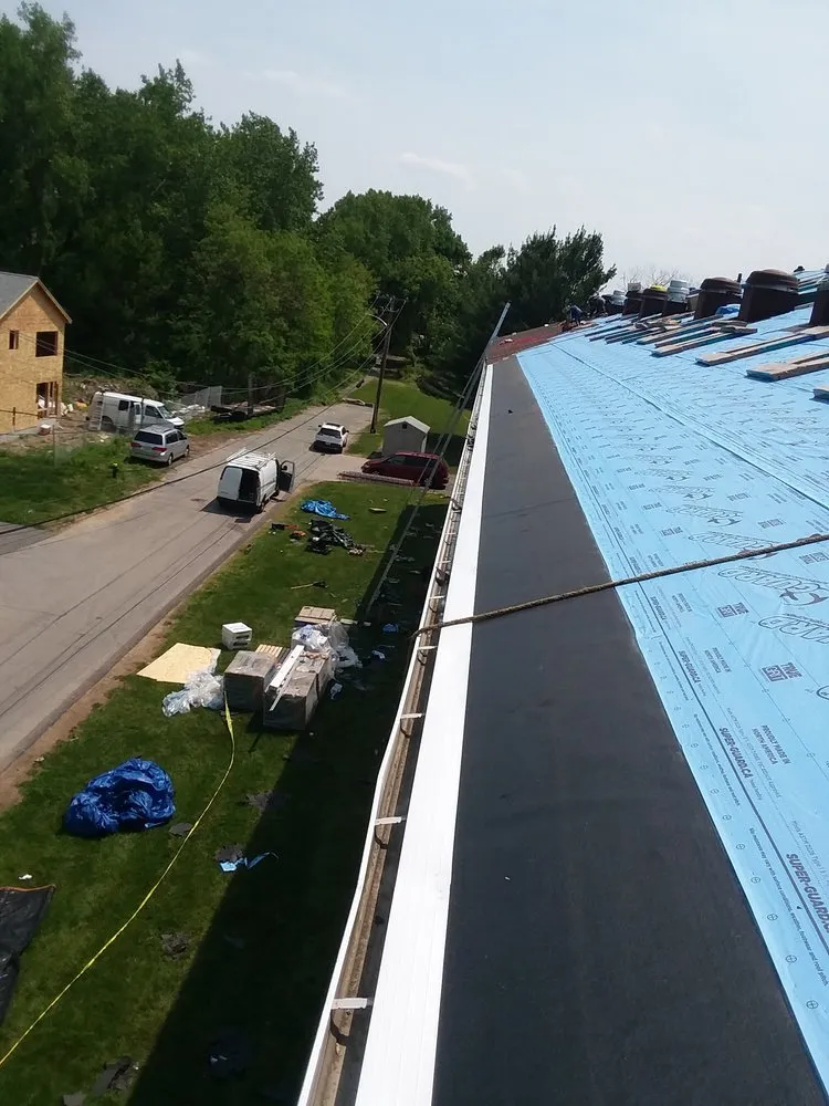 Slide of Abey Roofing Construction