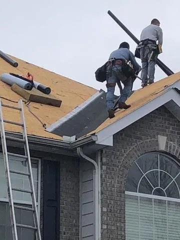 Slide of Abey Roofing Construction