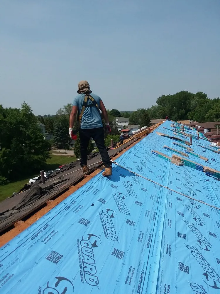 Slide of Abey Roofing Construction