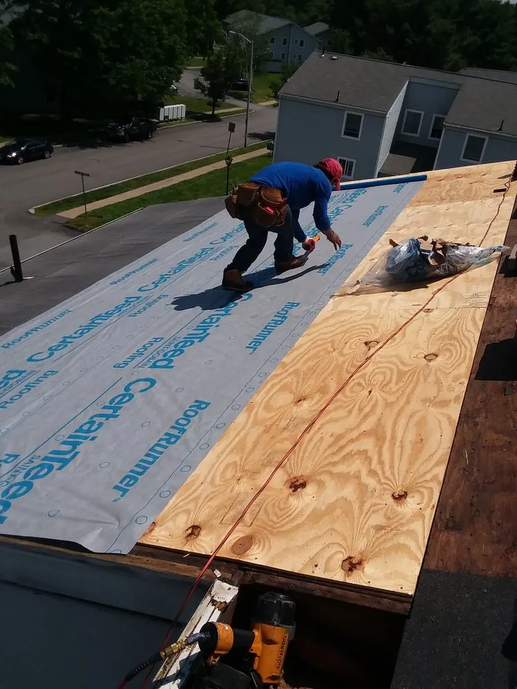 Slide of Abey Roofing Construction