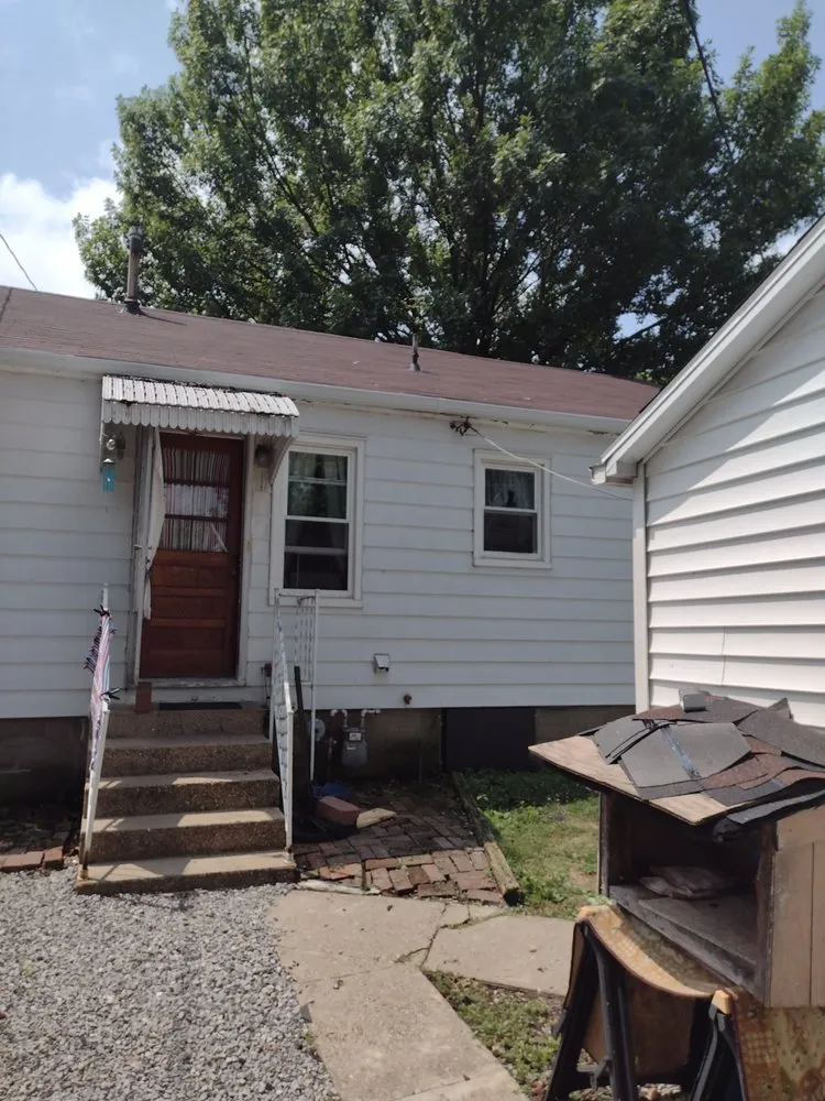 Slide of ABF Roofing Siding And More