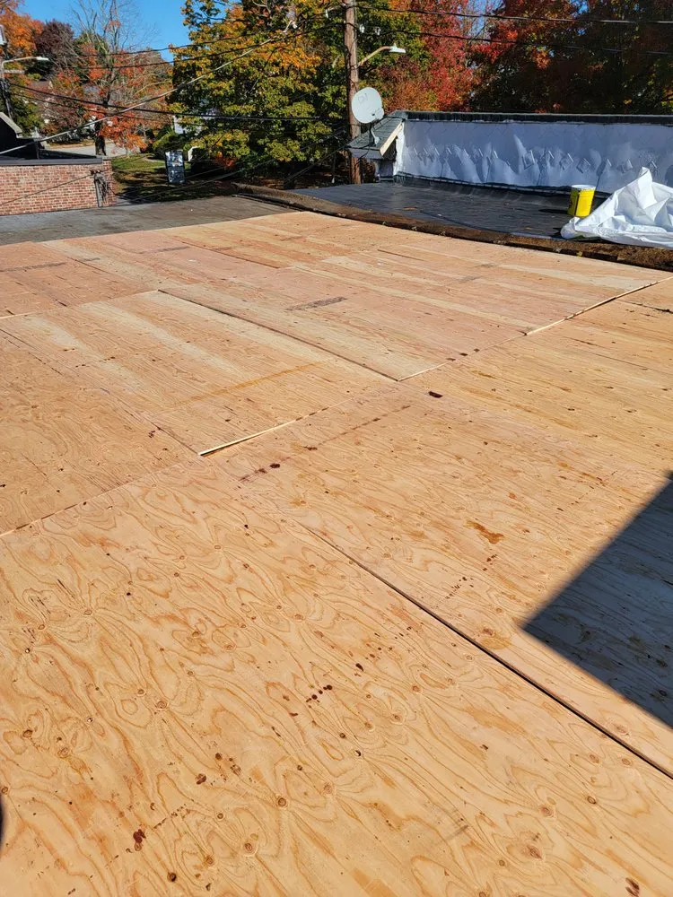 Slide of Able roofing company