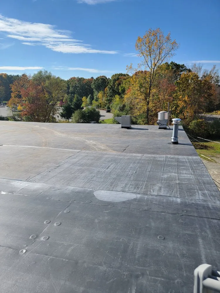 Slide of Able roofing company