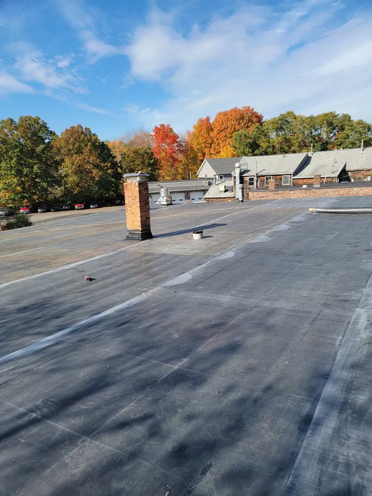 Slide of Able roofing company