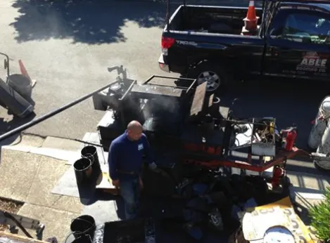 Slide of Able Roofing Company