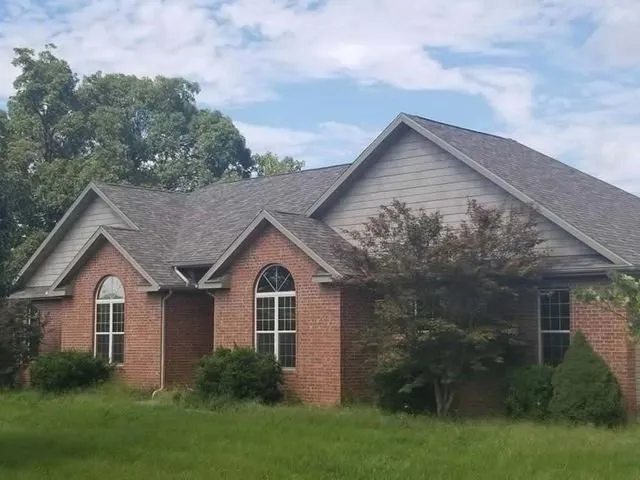 Slide of Above & Beyond Roofing