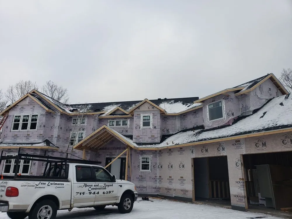 Slide of Above And Beyond Construction