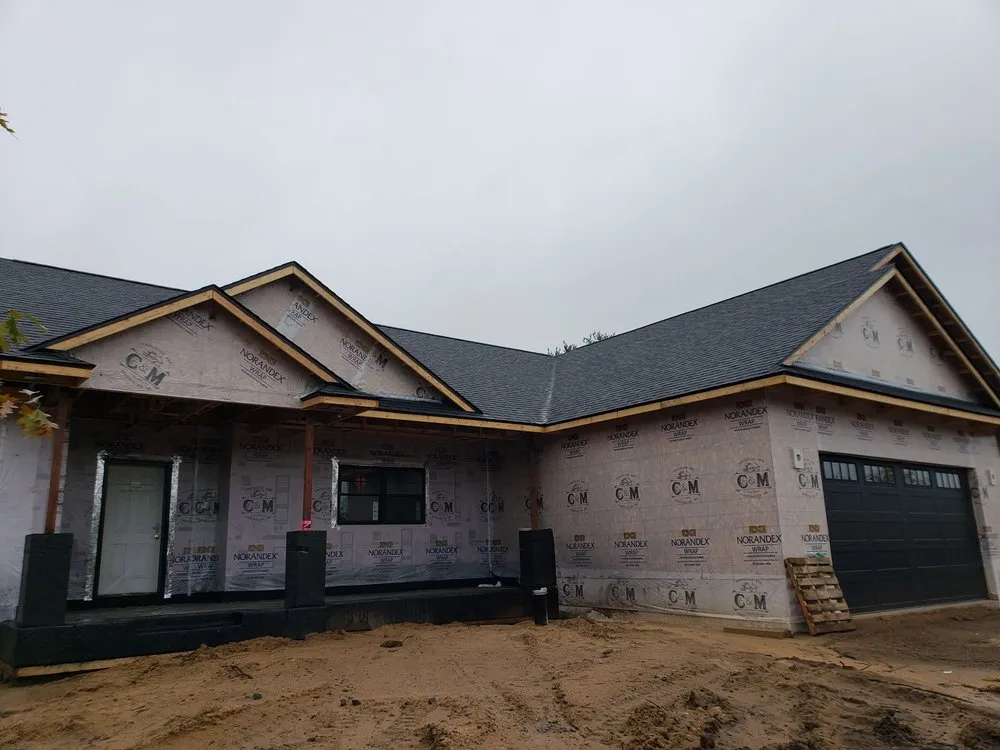 Slide of Above And Beyond Construction