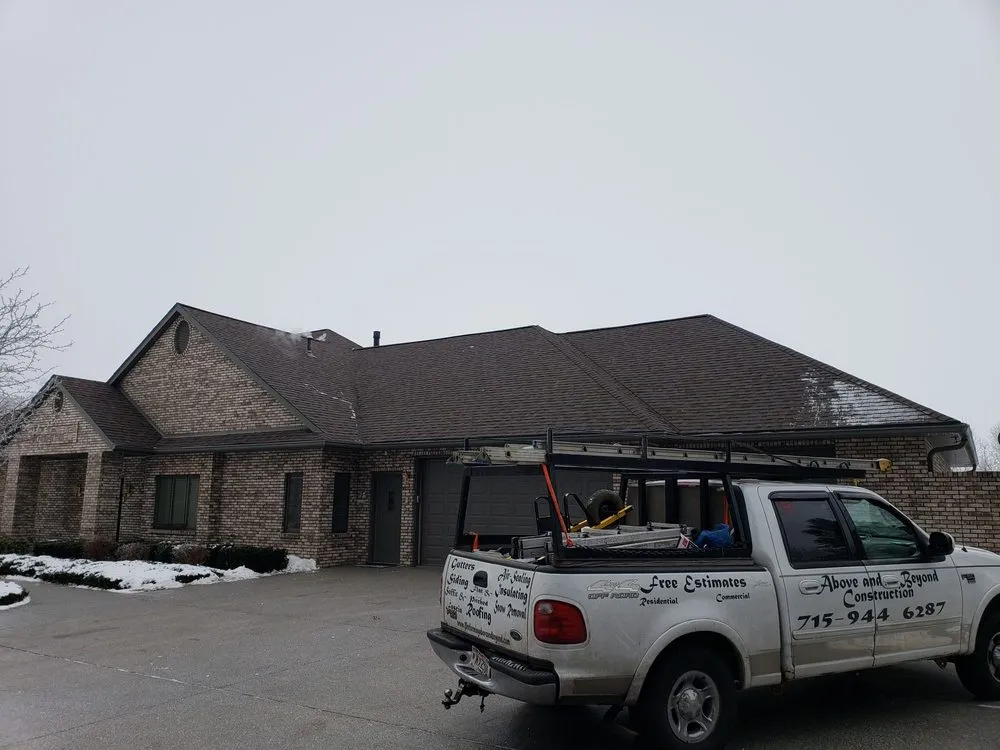 Slide of Above And Beyond Construction