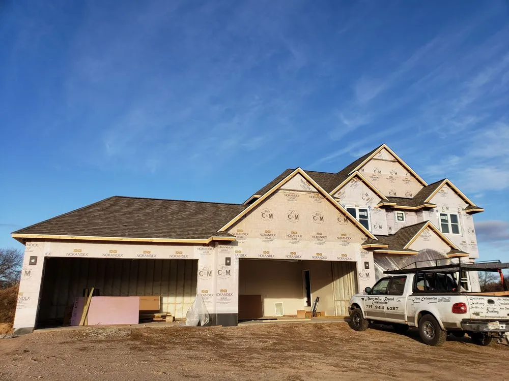 Slide of Above And Beyond Construction