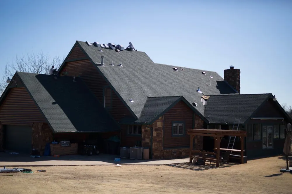 Slide of Above It All Roofing & Construction