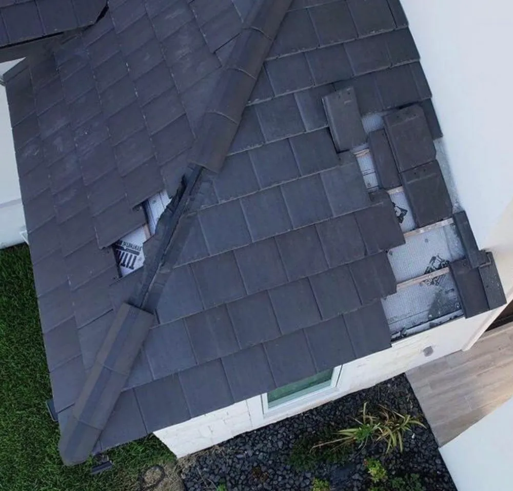 Slide of Above Quality Roofing