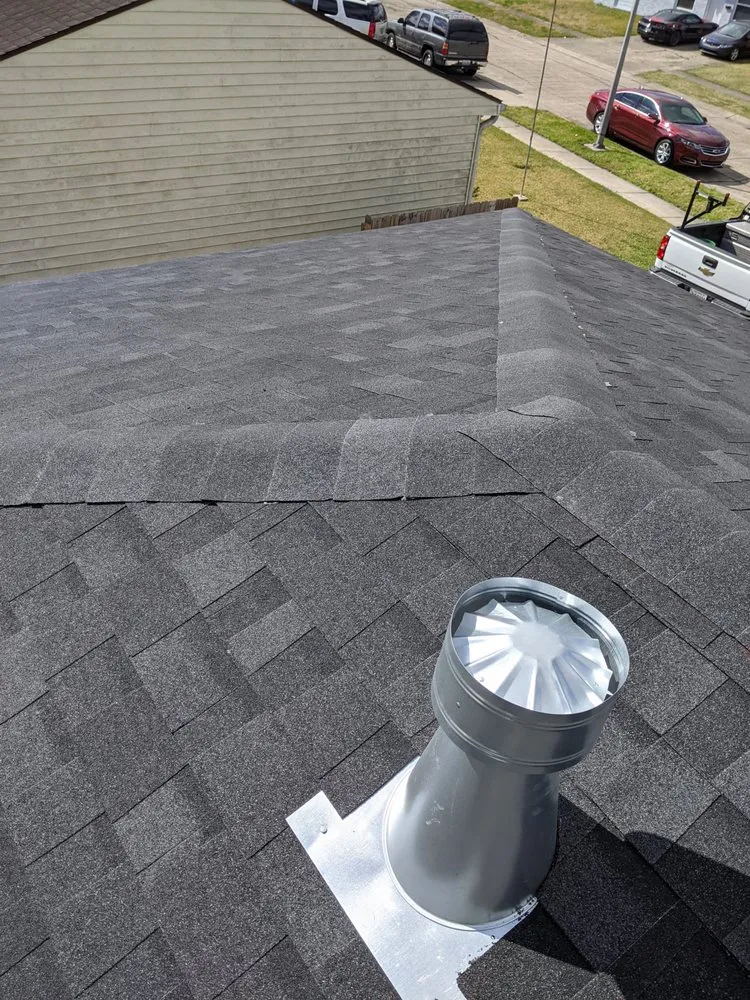 Slide of Above Standard Roofing