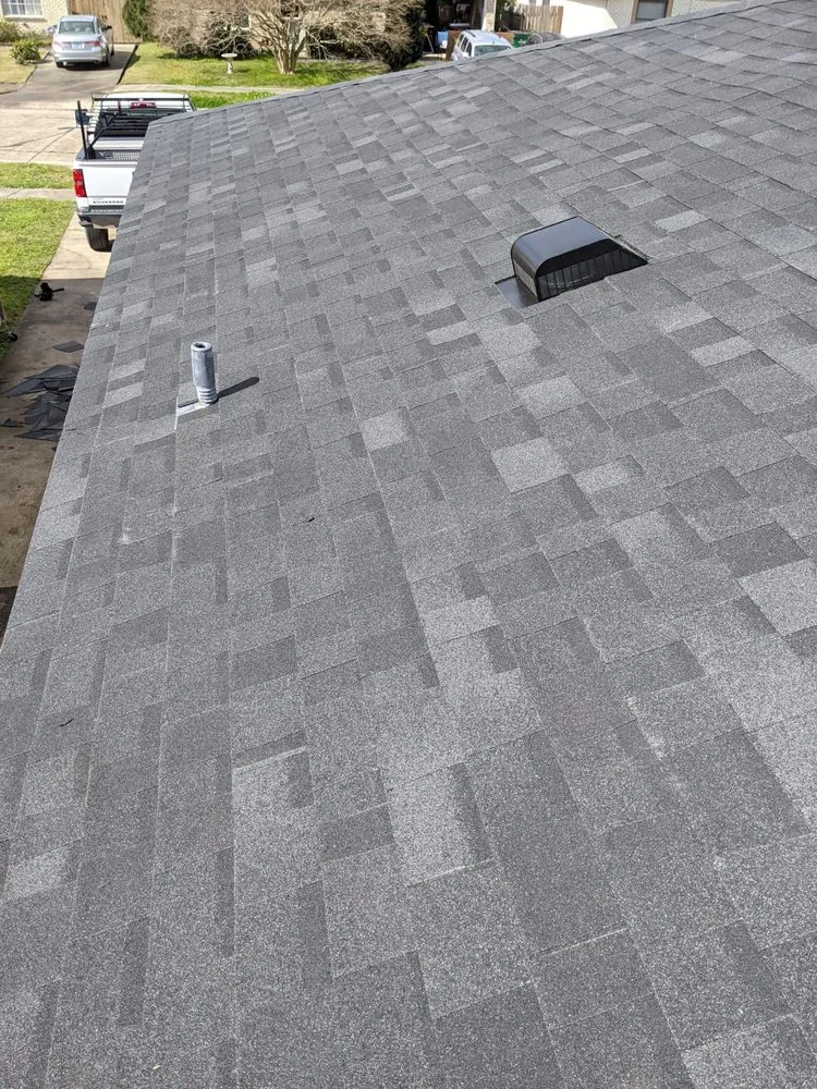 Slide of Above Standard Roofing