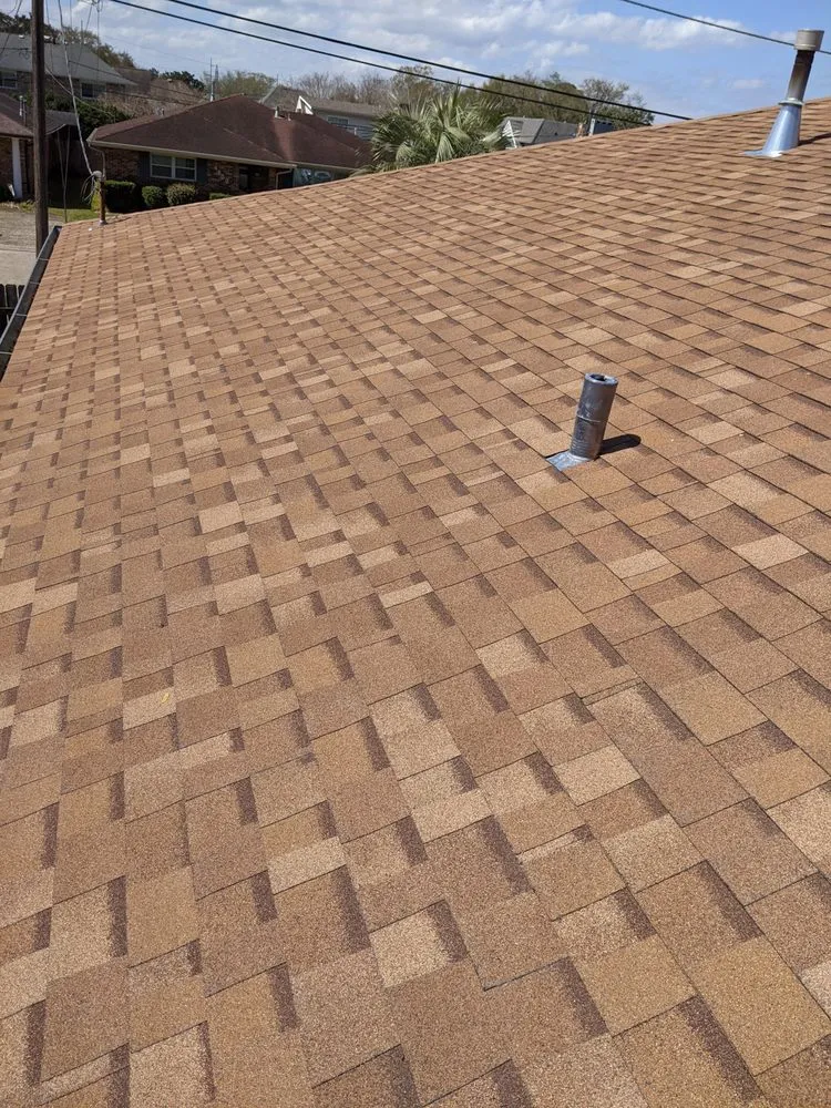 Slide of Above Standard Roofing