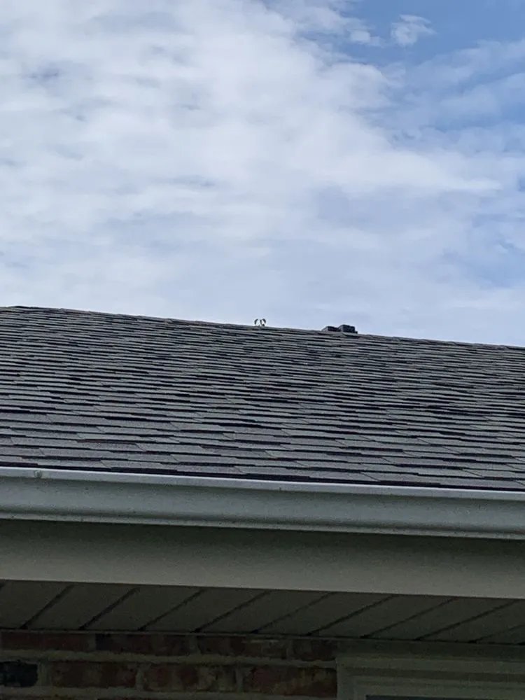 Slide of Above Standard Roofing