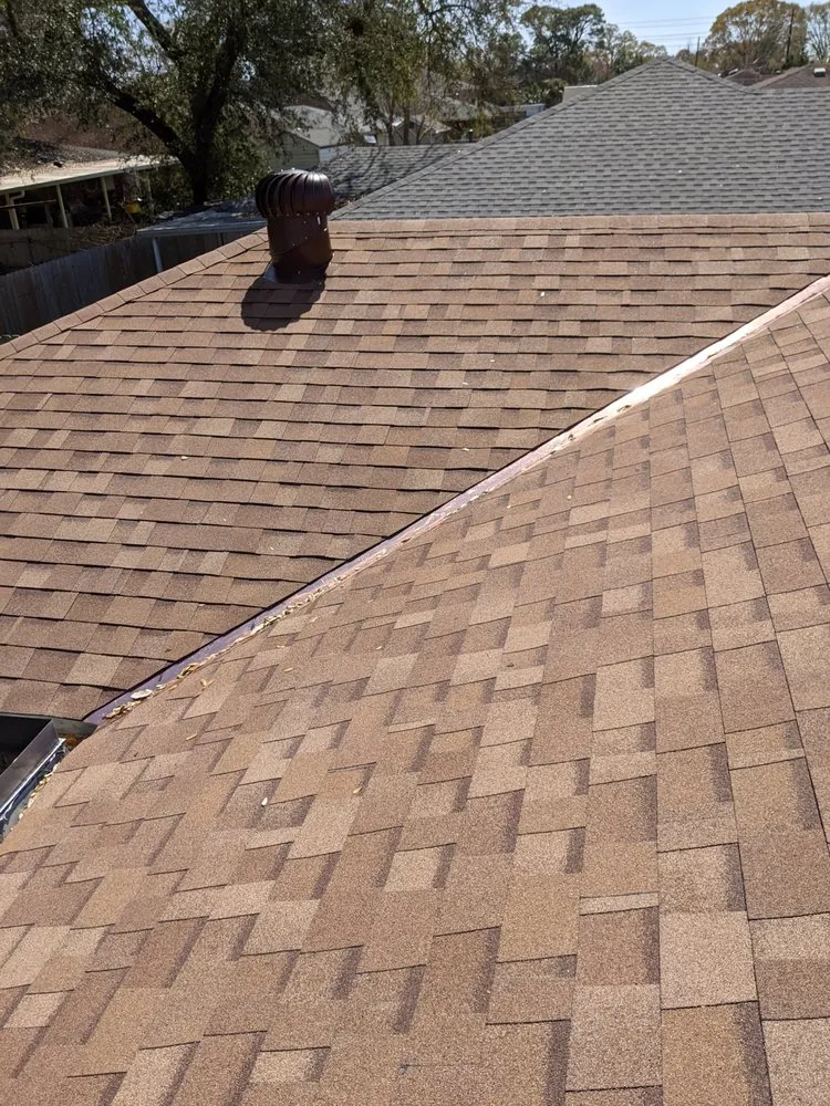 Slide of Above Standard Roofing