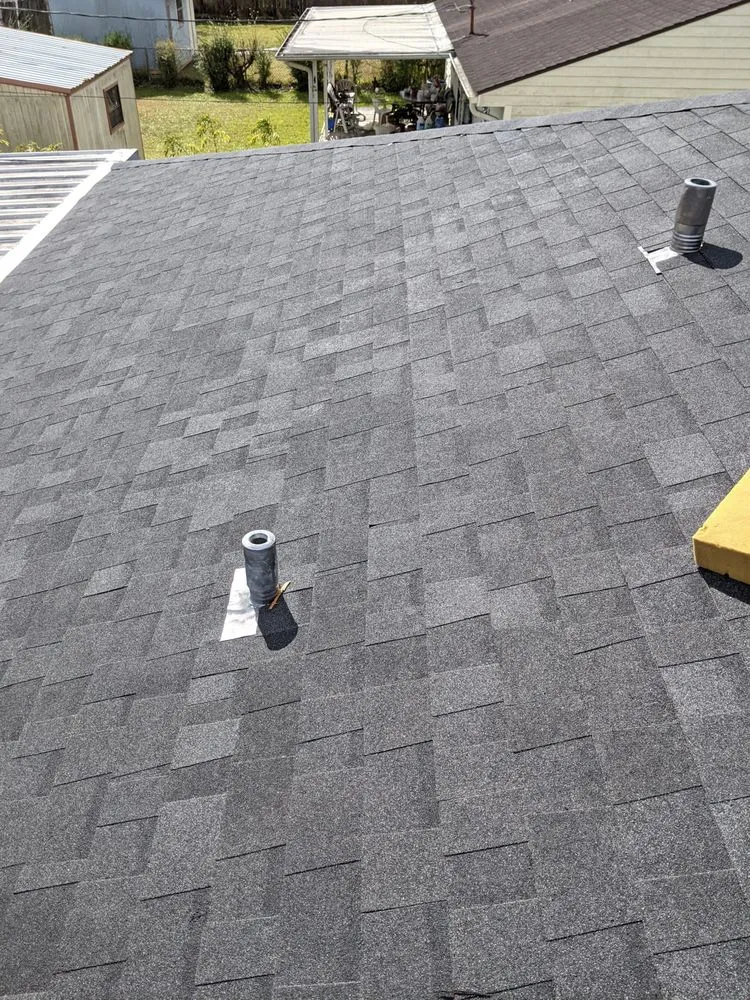 Slide of Above Standard Roofing