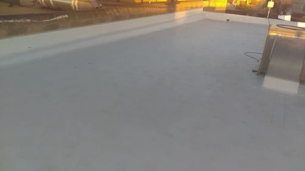 Slide of ABQ Star Roofing