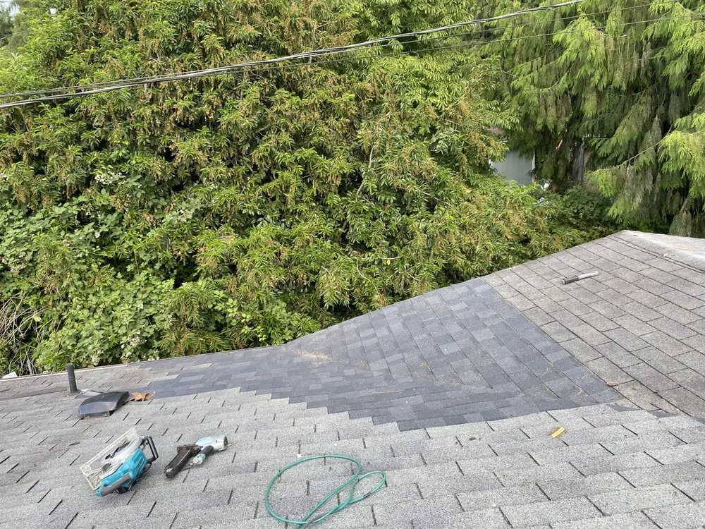 Slide of Abraham Roofing Services