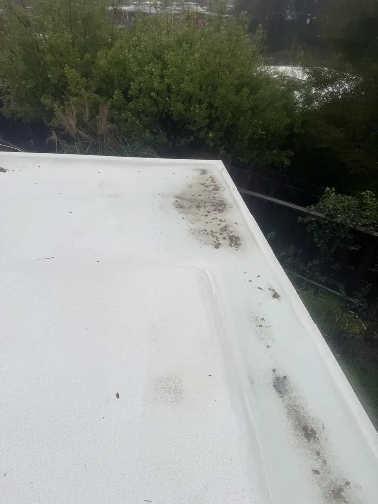 Slide of Abril Roofing