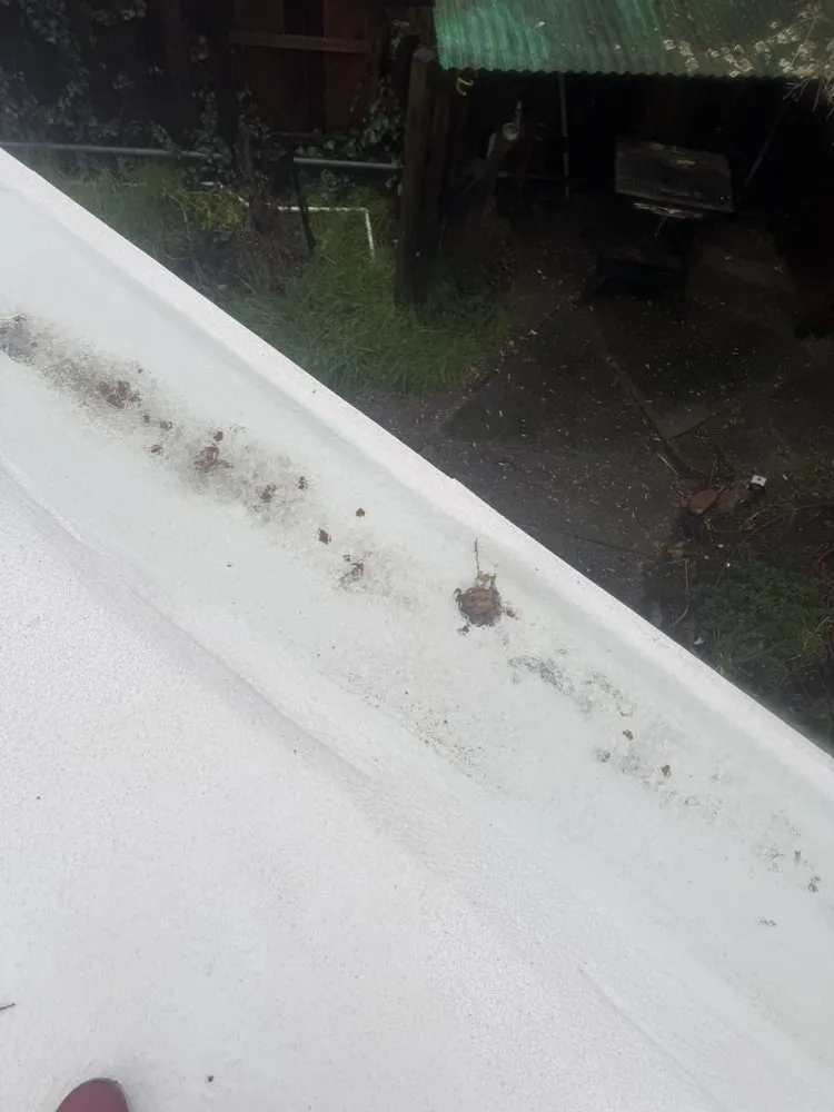 Slide of Abril Roofing